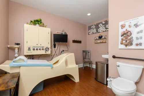 The private colon hydrotherapy suite with open-system equipment and ensuite facilities